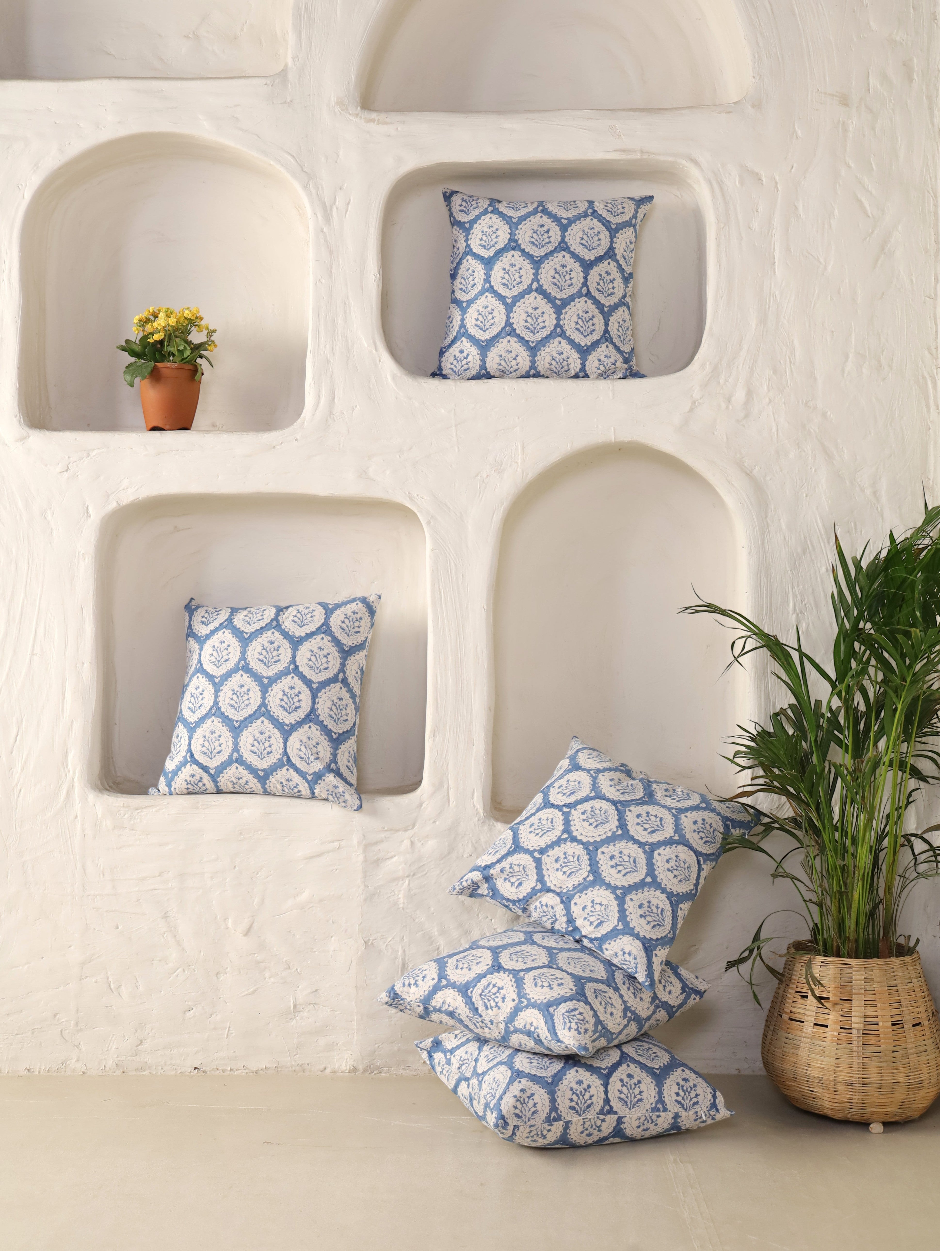 The Block & Bloom dusty blue cotton cushion covers with traditional hand block printed floral buta motifs.