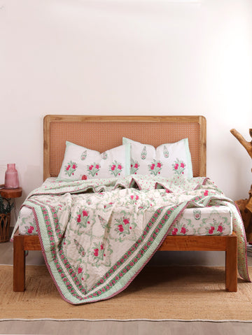 The Block & Bloom Pomegranate Meadow 4pc bedding set with pink floral block print on soft cotton voile quilt and sheets